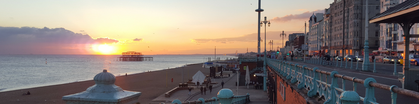 Brighton & Hove seafront at sunset.