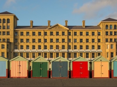 Beach huts on Hove promenade in Brighton & Hove.