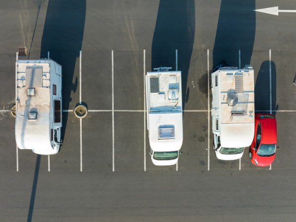 Campervans parked in a car parking.