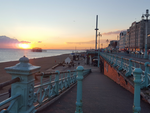 Brighton & Hove seafront at sunset.
